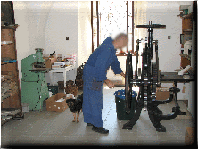 Working in the book bindery - cutting